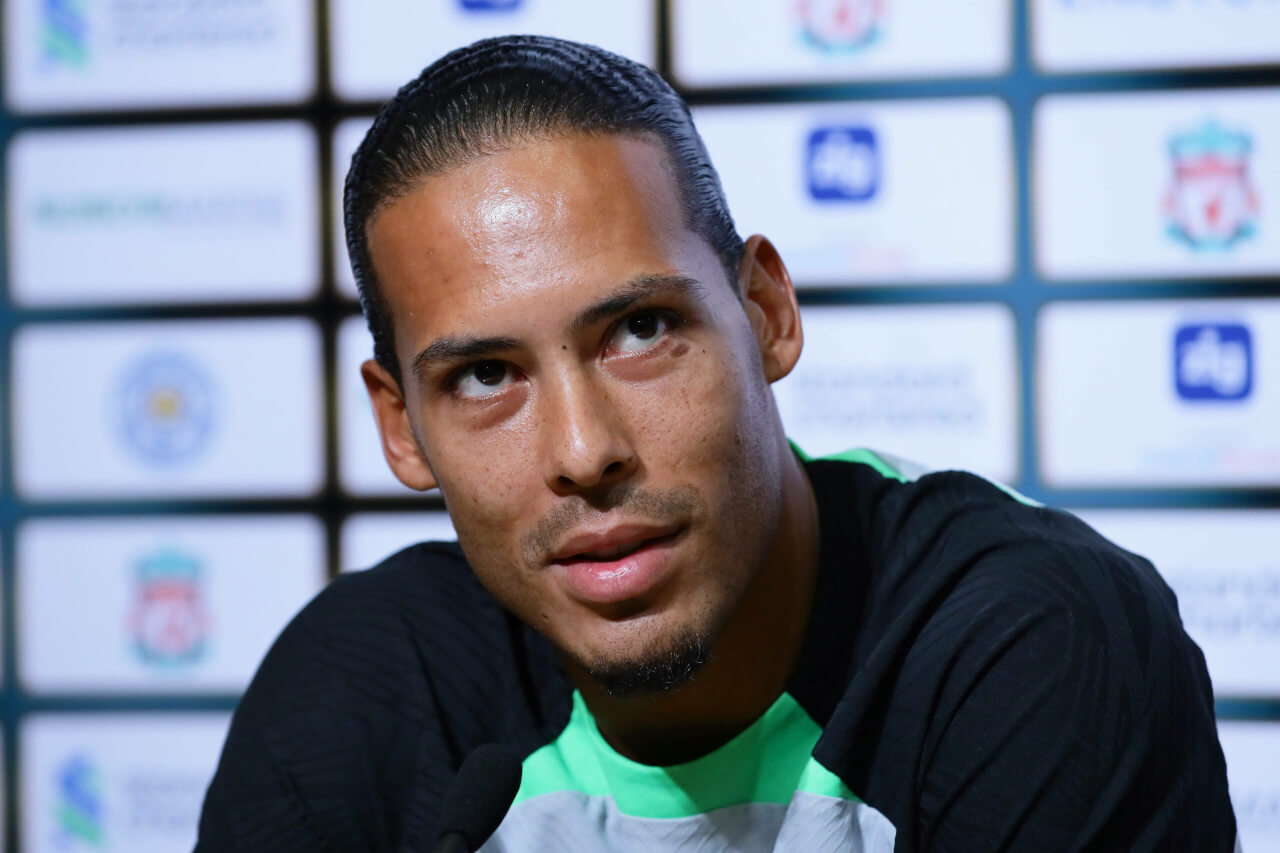 Liverpool star Virgil van Dijk insists he would take a pay cut in encounter with reporter